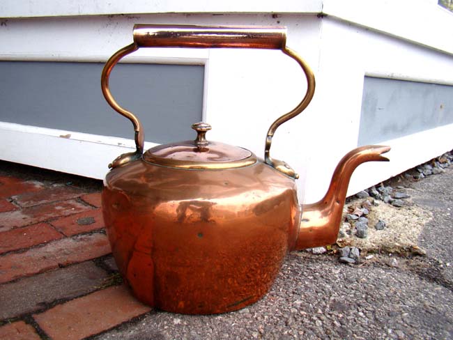 A large English copper kettle circa 1800-1840 stamped "G.Lang, 46 Gerrard St. W"